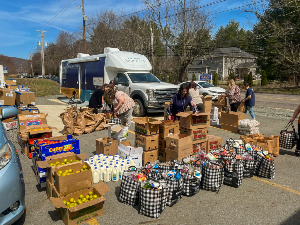 Wright Center employees working at a community food drive